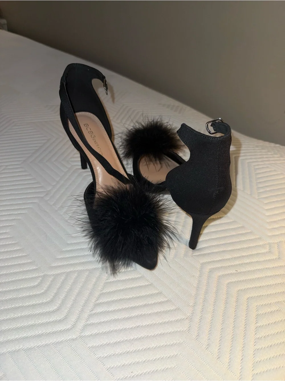 BCBGeneration Black Pom-Pom Ankle-Strap Pointed-Toe Heels